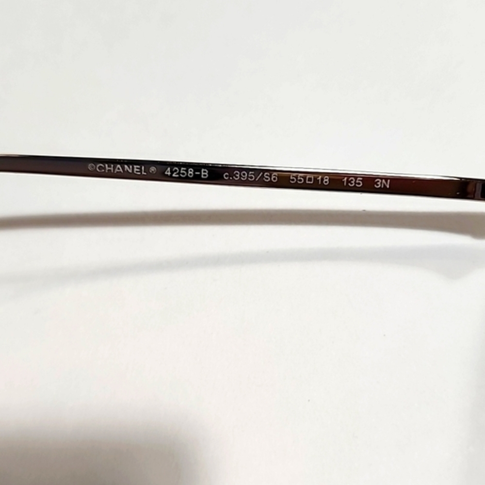 CHANEL Gold and Black Sunglasses - Picture 13 of 14
